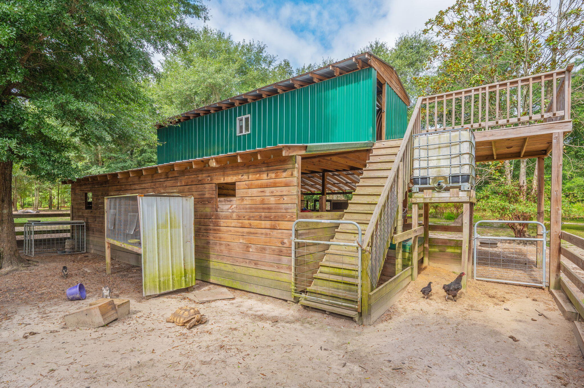 8362 Davis Road Laurel Hill, FL 32567 - Photo 29 of 53 a view of a house with a backyard