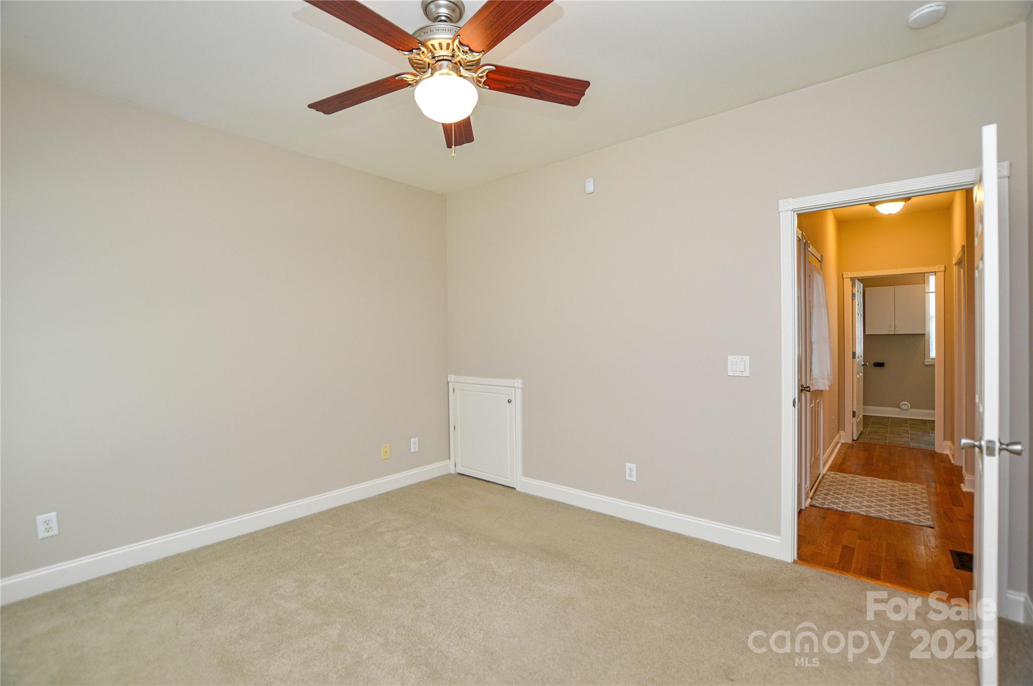 3333 Harmony Road Catawba, SC 29704 - Photo 23 of 39 an empty room with closet and a chandelier fan