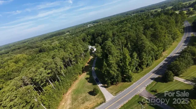 a view of balcony with wooden floor