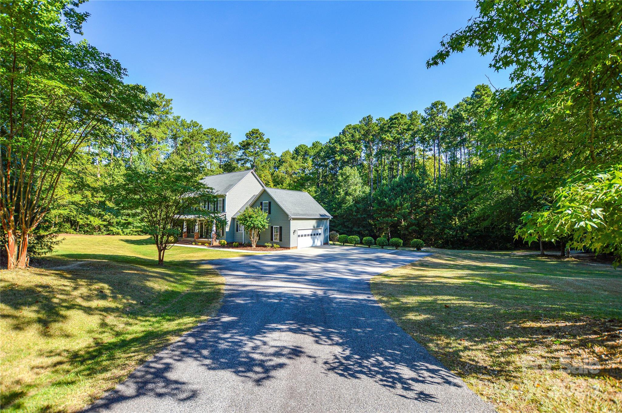 3333 Harmony Road Catawba, SC 29704 - Photo 5 of 39 a front view of a house with a yard
