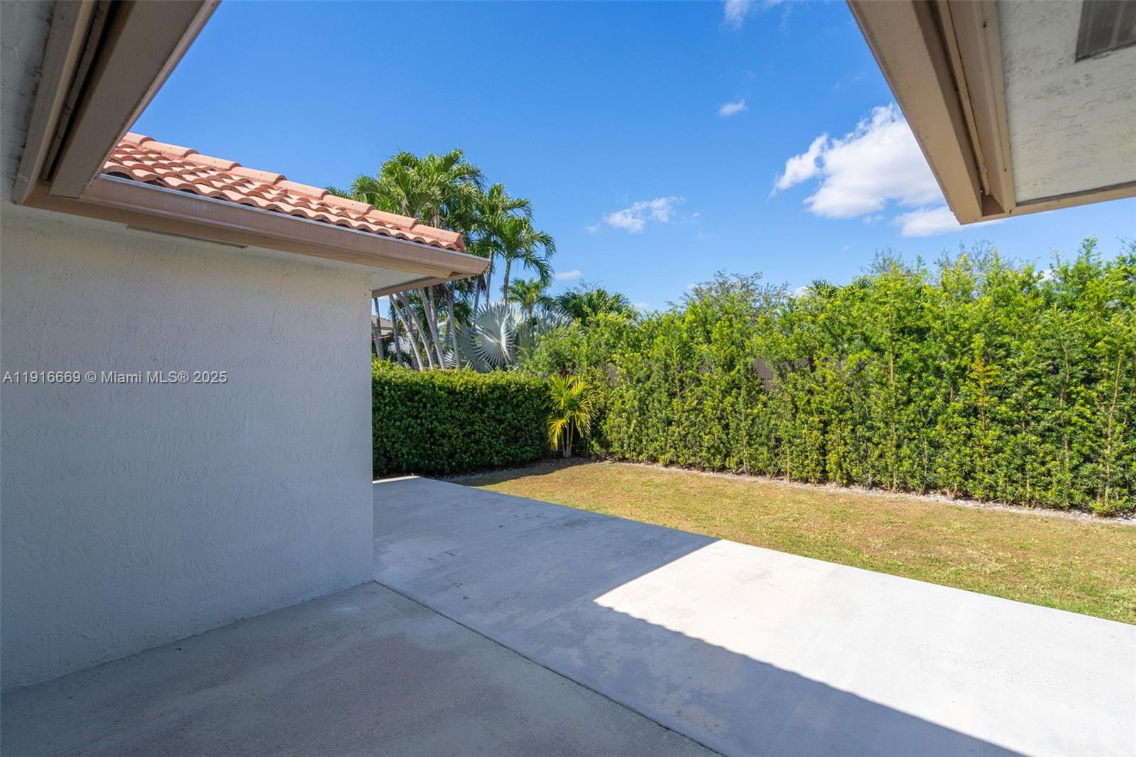 15057 Southwest 32nd Street Miami, FL 33165 - Photo 27 of 31 a view of backyard with potted plants