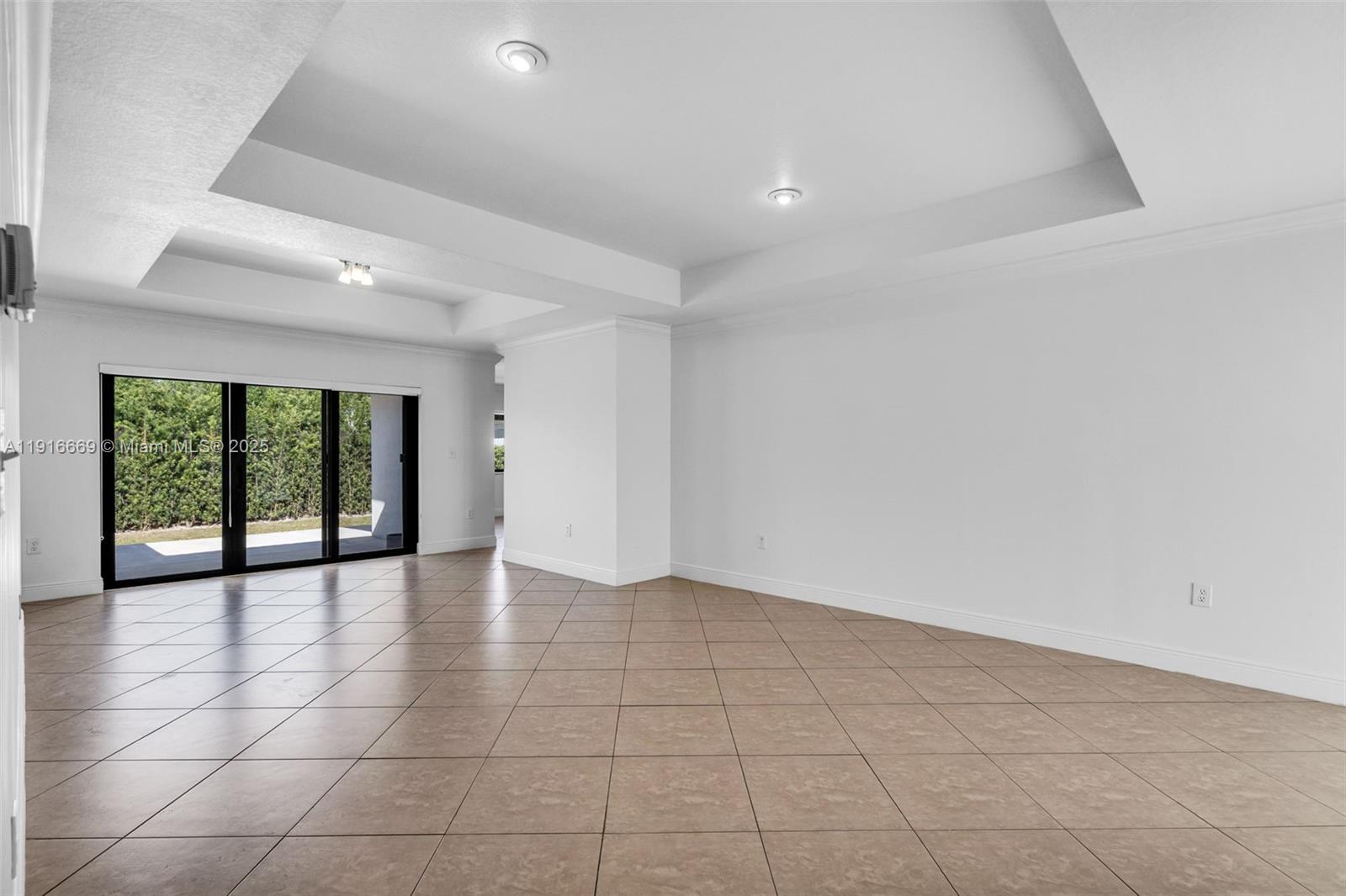 15057 Southwest 32nd Street Miami, FL 33165 - Photo 5 of 31 a view of an empty room with a window