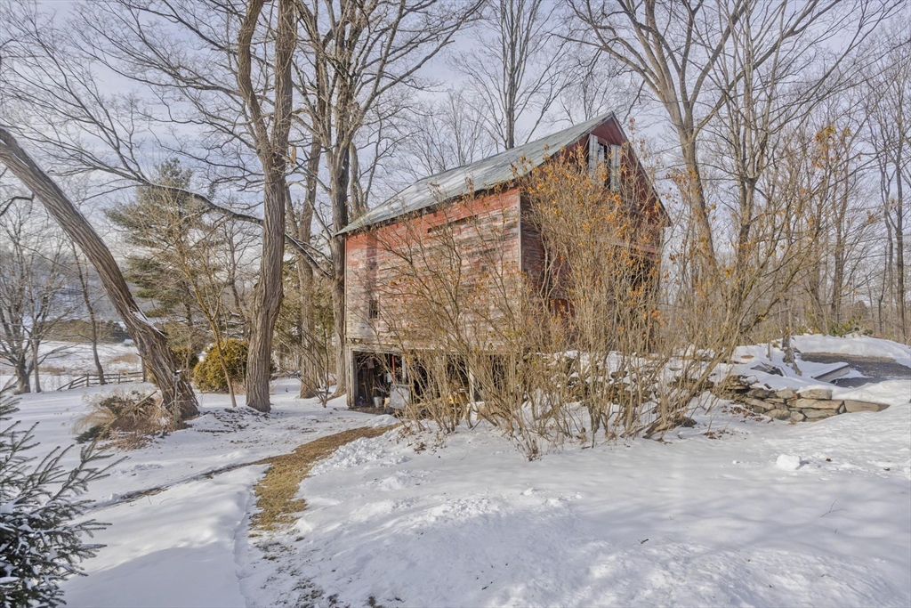 17 Old Sunderland Road Montague, MA 01351 - Photo 6 of 42 a view of a yard covered in snow