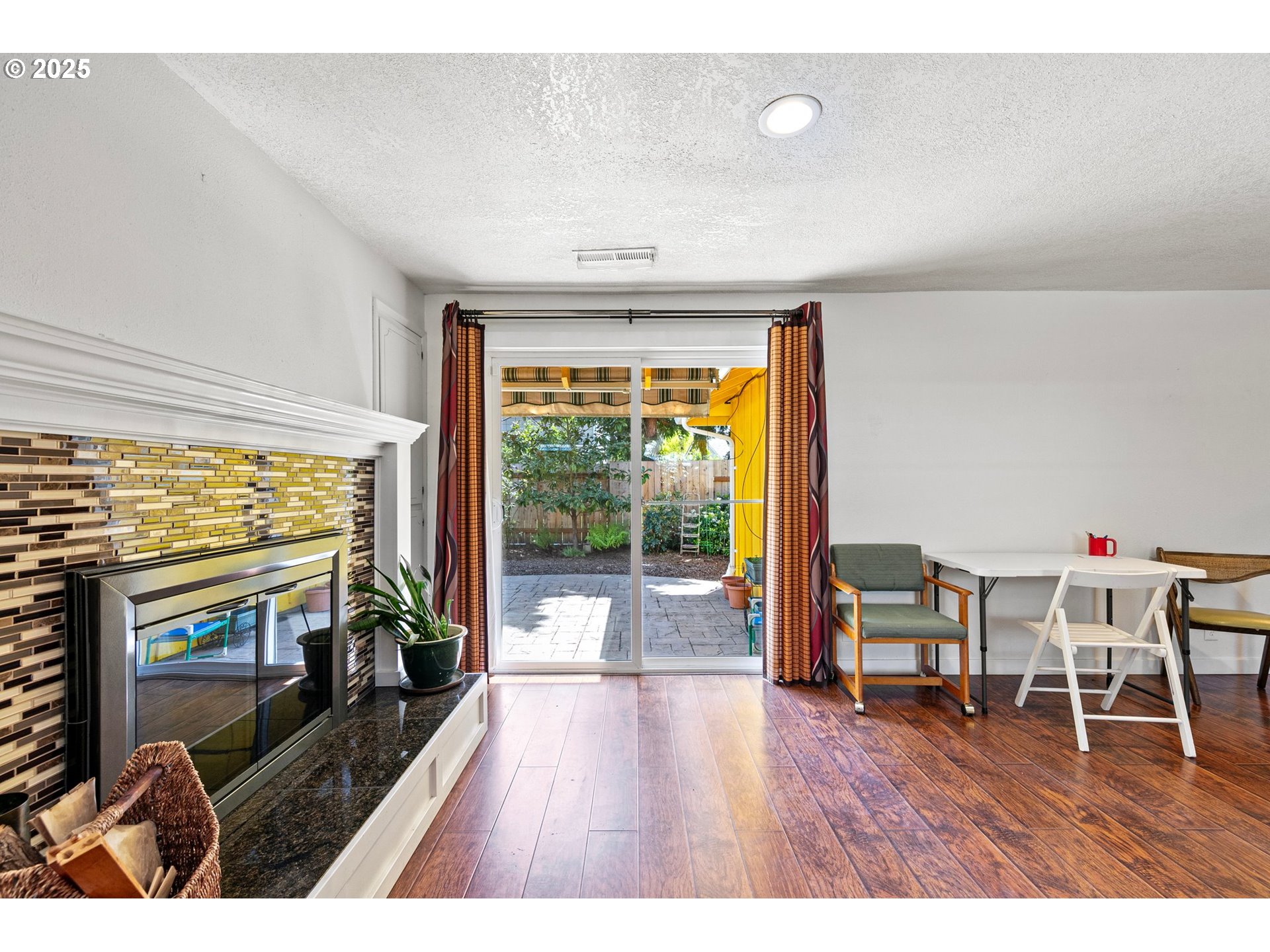1170 Cal Young Road Eugene, OR 97401 - Photo 27 of 40 a living room with furniture and a flat screen tv