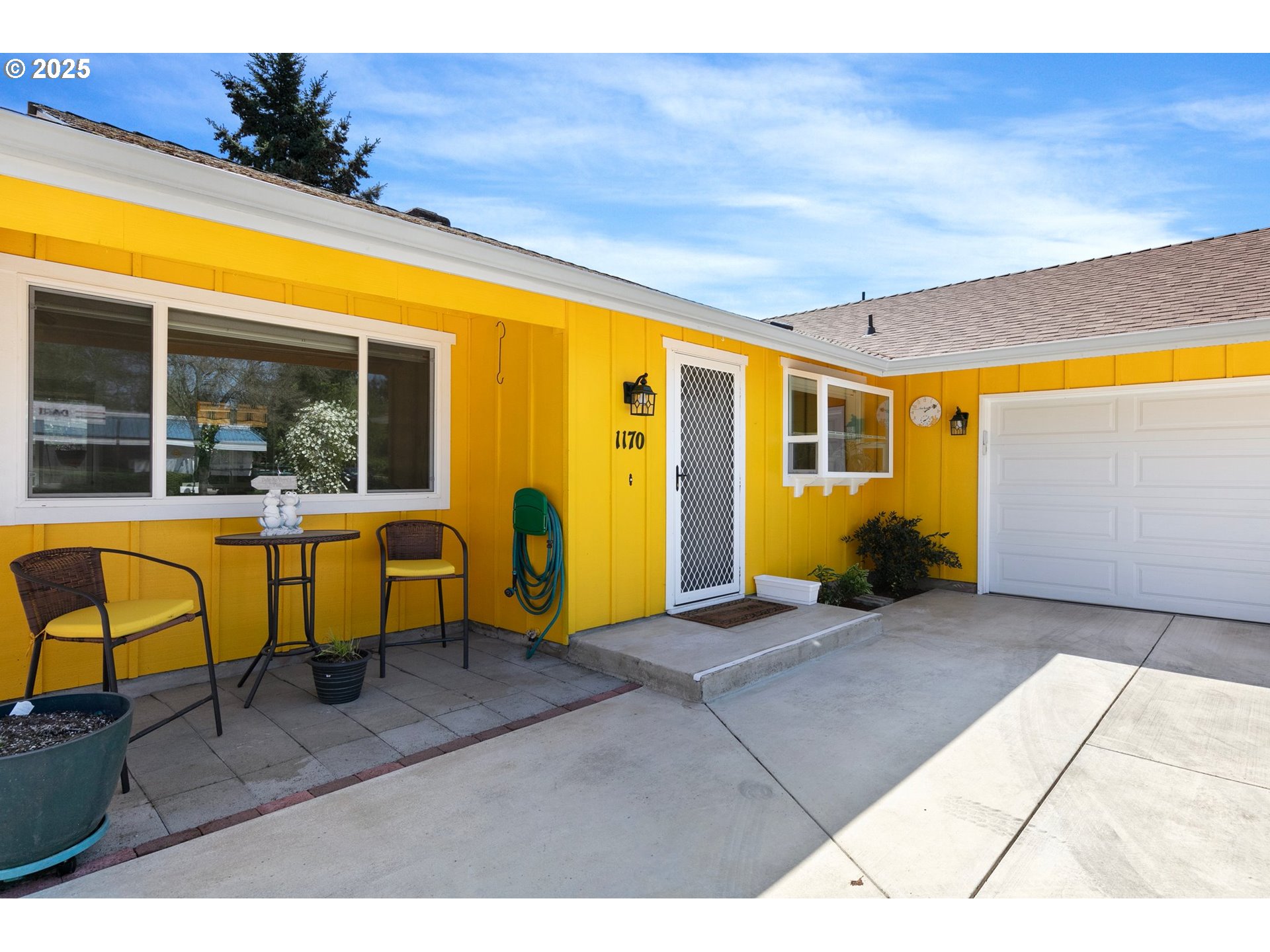 1170 Cal Young Road Eugene, OR 97401 - Photo 9 of 40 a view of an chairs and tables in the patio
