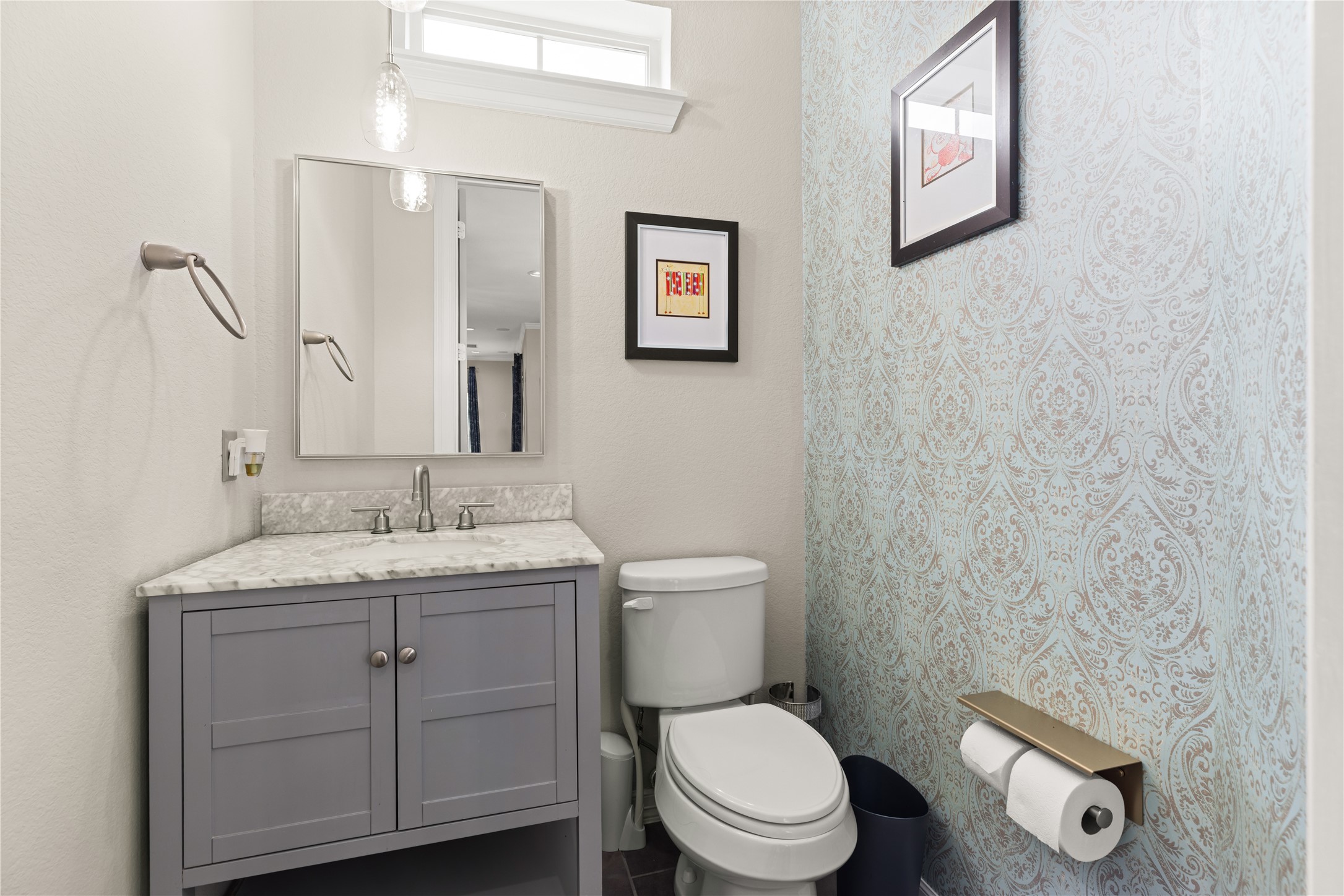10215 Spring Shadows Park Circle Houston, TX 77080 - Photo 20 of 44 Updated half bathroom on second/main level.