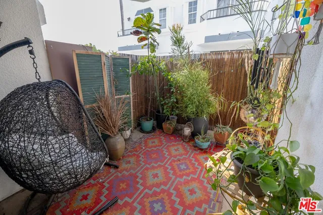 a living room with furniture and a yard