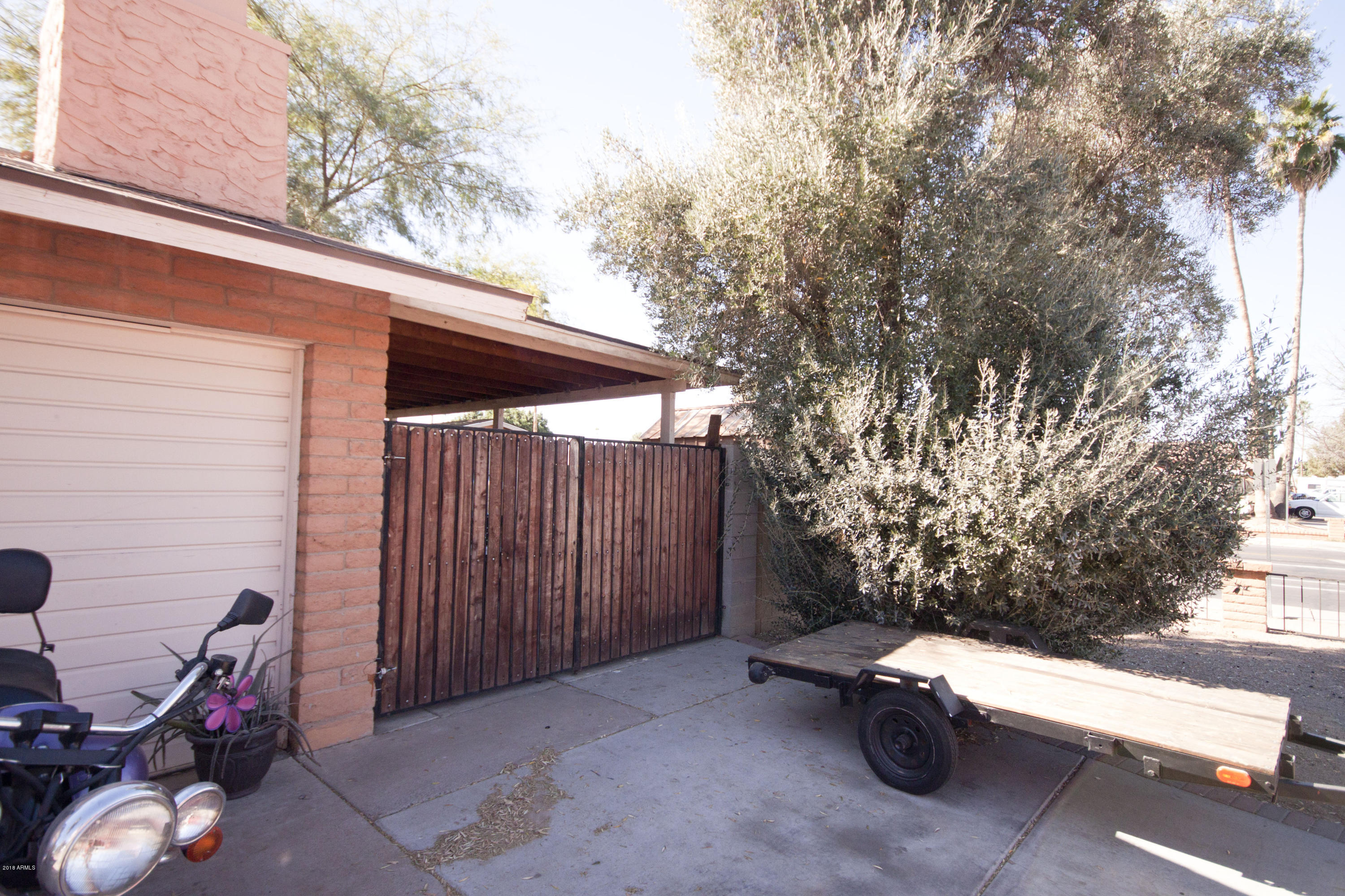 4643 West Mountain View Road Glendale, AZ 85302 - Photo 3 of 26 Front Car Entry Gate