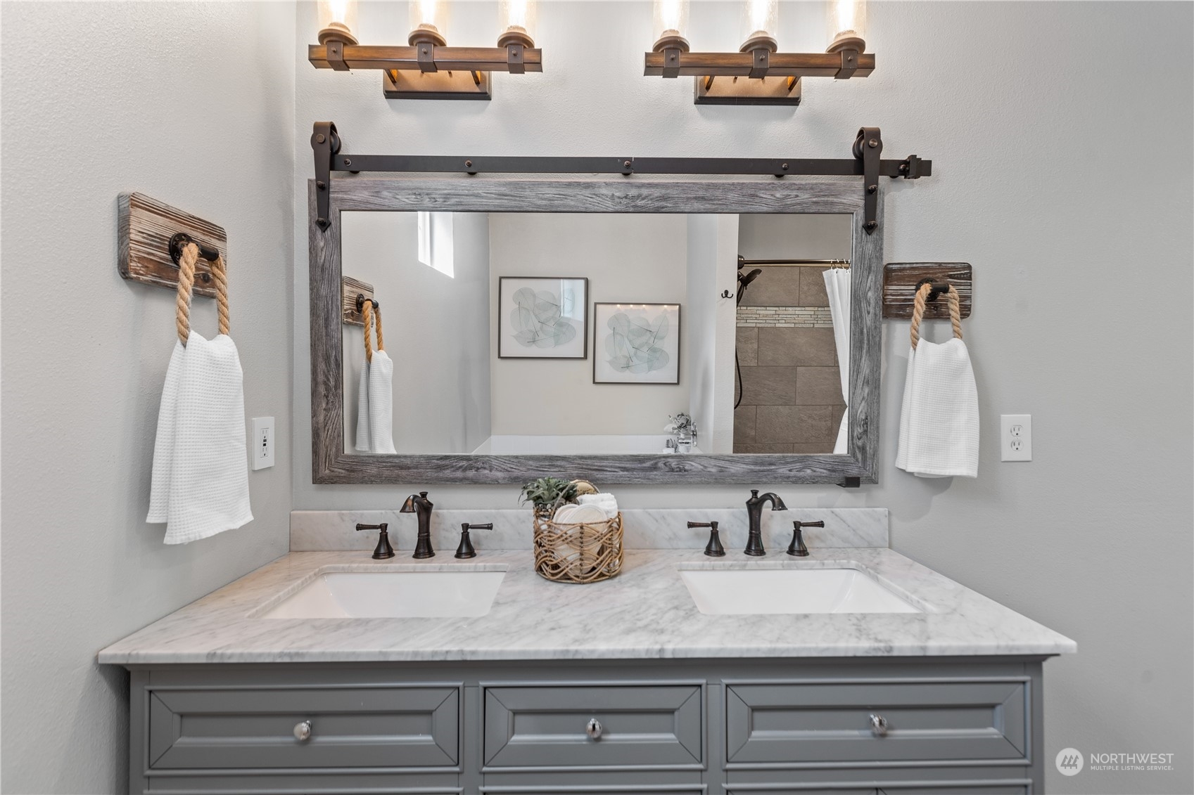 306 South Lake Roesiger Road Snohomish, WA 98290 - Photo 26 of 40 a bathroom with sinks vanity and a mirror