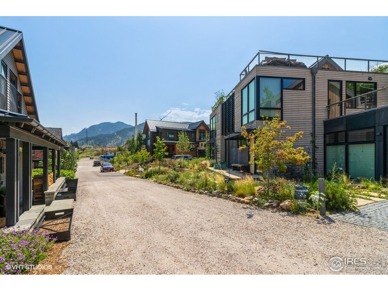 2555 3rd Street Boulder, CO 80304 - Photo 15 of 29 a yellow house with trees in front of it