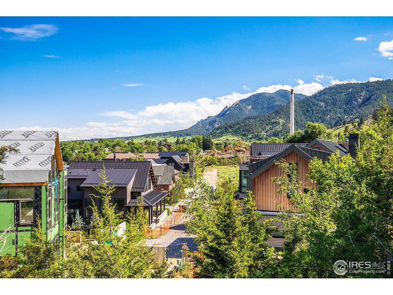 2555 3rd Street Boulder, CO 80304 - Photo 7 of 29 a view of a house with a yard and mountain