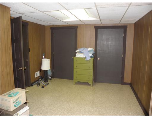 1255 Country Club Road Monongahela, PA 15063 - Photo 16 of 18 Den. A third large room in lower level featuring a smaller dark room w/ sink for photo developing