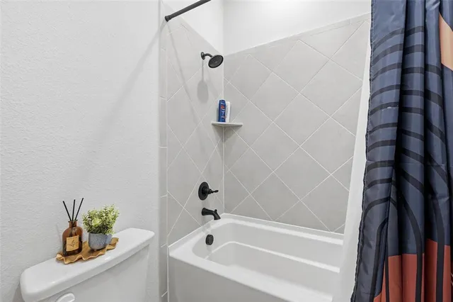 a bathroom with a bathtub