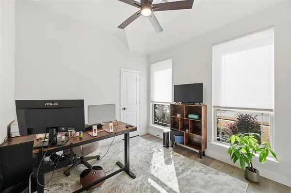 a view of a workspace with furniture