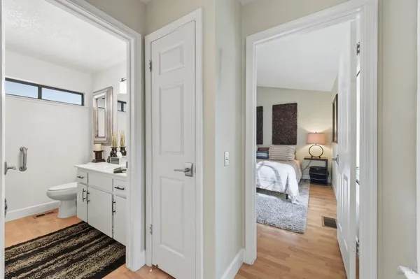 a en suite bathroom with a toilet sink and shower