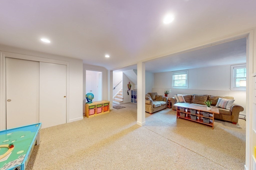 11 Stagecoach Road Medfield, MA 02052 - Photo 26 of 38 a bedroom with furniture and a table