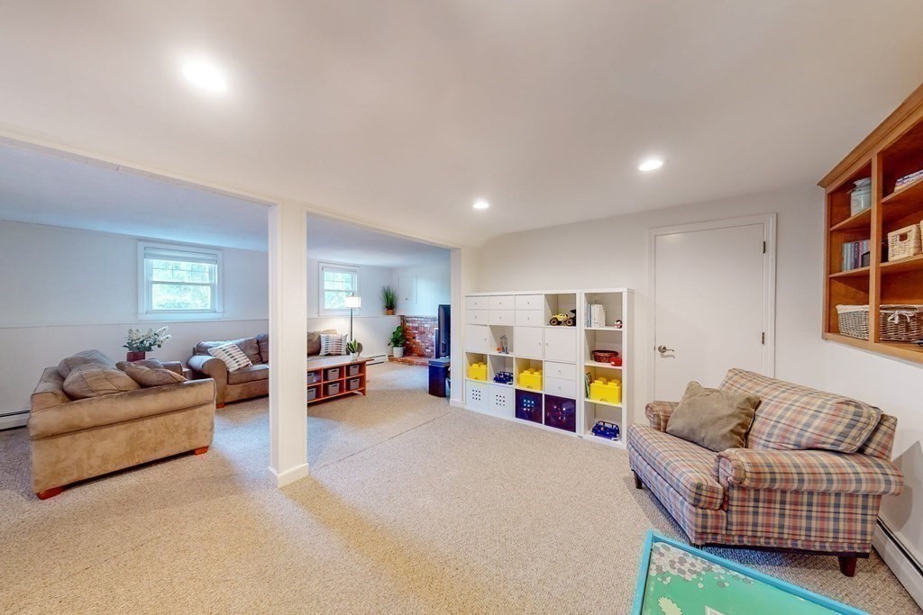 11 Stagecoach Road Medfield, MA 02052 - Photo 27 of 38 a living room with furniture and a couch