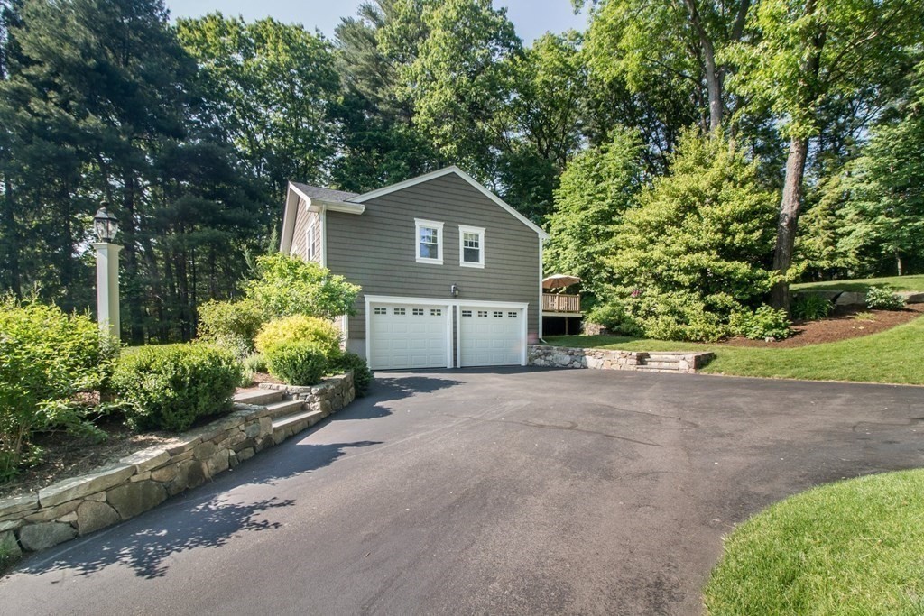 11 Stagecoach Road Medfield, MA 02052 - Photo 32 of 38 a house with trees in the background