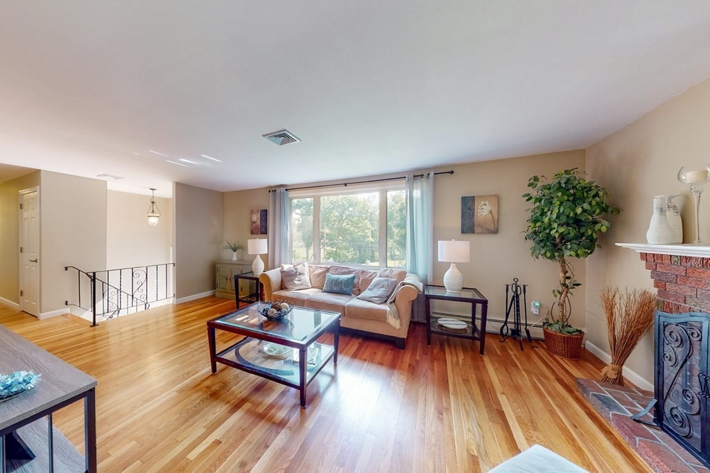 11 Stagecoach Road Medfield, MA 02052 - Photo 6 of 38 a living room with furniture and a wooden floor