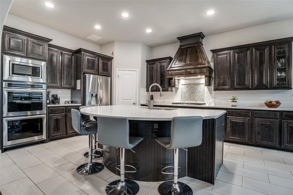 Kitchen with gas cooktop double convection oven