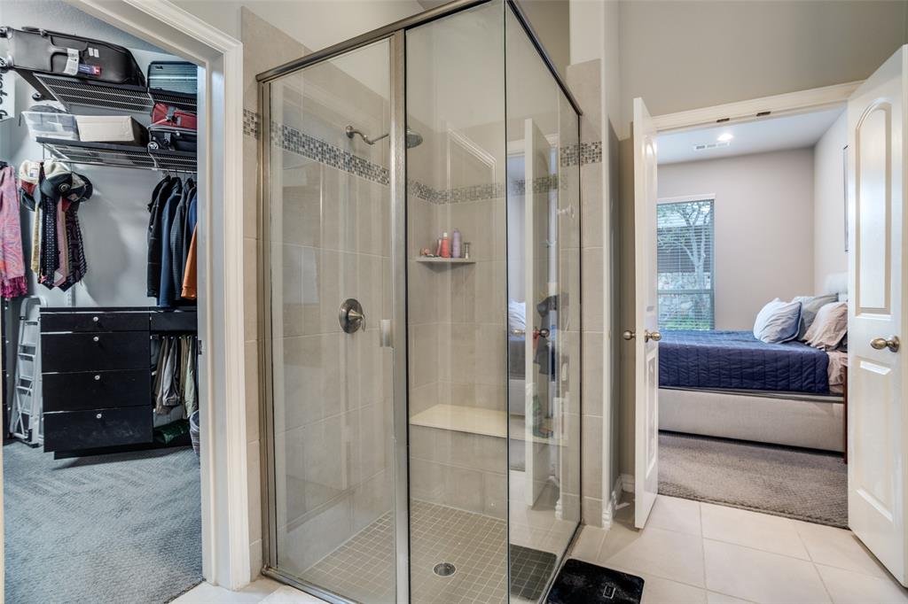 3410 Challis Trail McKinney, TX 75070 - Photo 16 of 31 a bathroom with a shower and a glass door shower