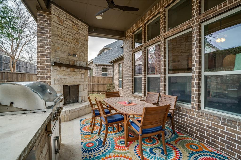 3410 Challis Trail McKinney, TX 75070 - Photo 5 of 31 Covered patio with grill, refrigerator, gas fireplace