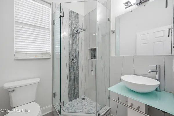 a view of an ocean from a city view