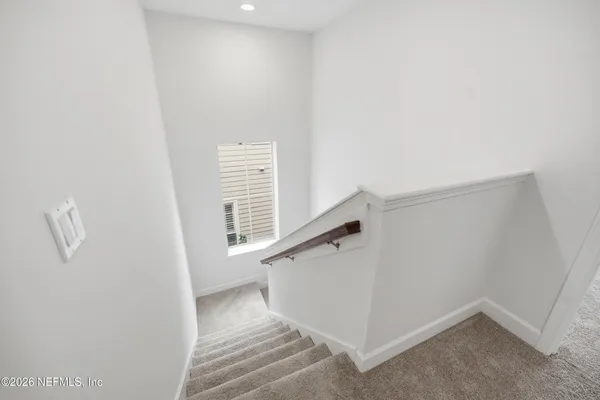 a view of a room with racks on the wall