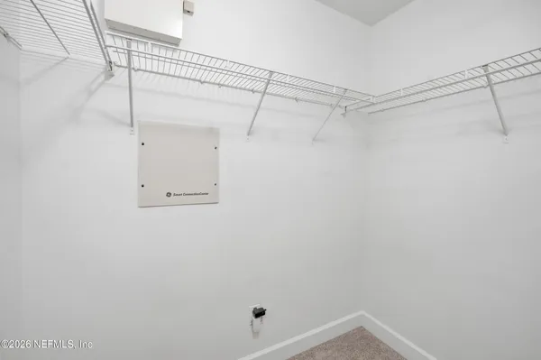 a view of a large house with a big yard