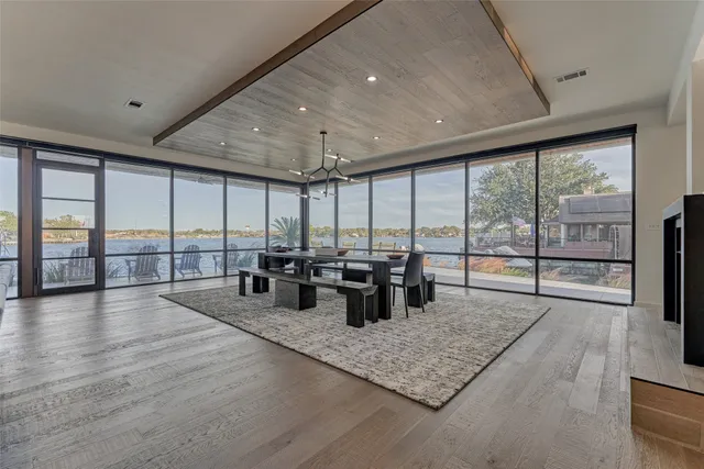 a lobby with furniture and large window