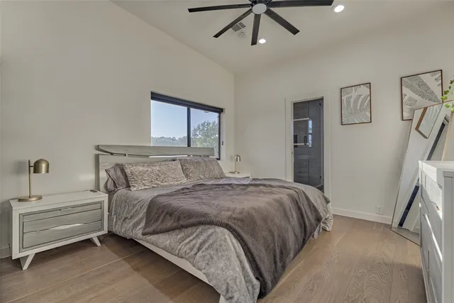 a bedroom with a bed and a walk in closet