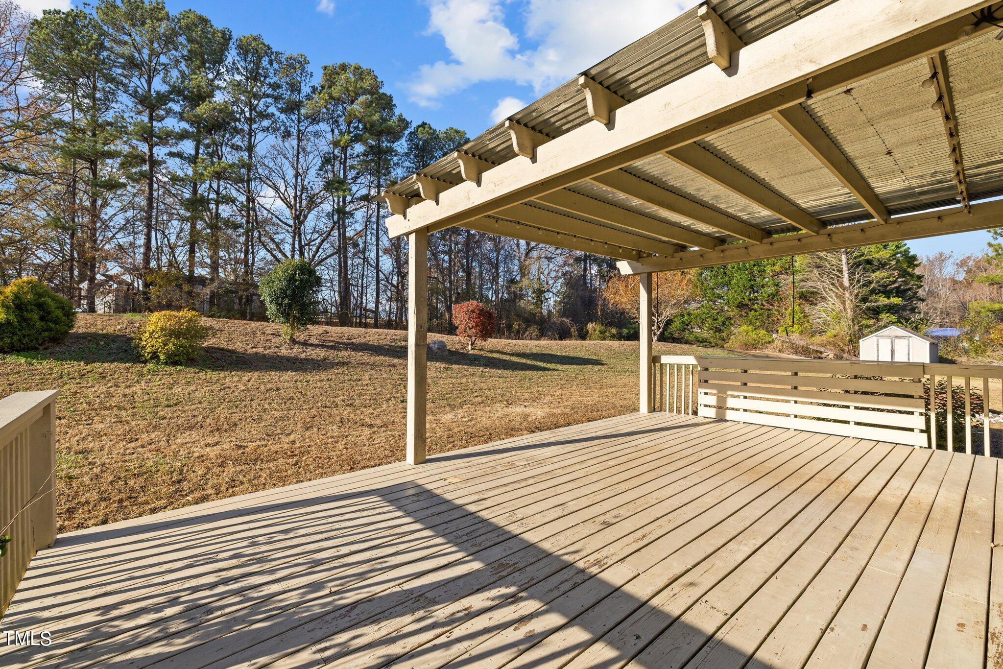 209 Priceview Drive Raleigh, NC 27603 - Photo 17 of 20 a view of a street with wooden floor
