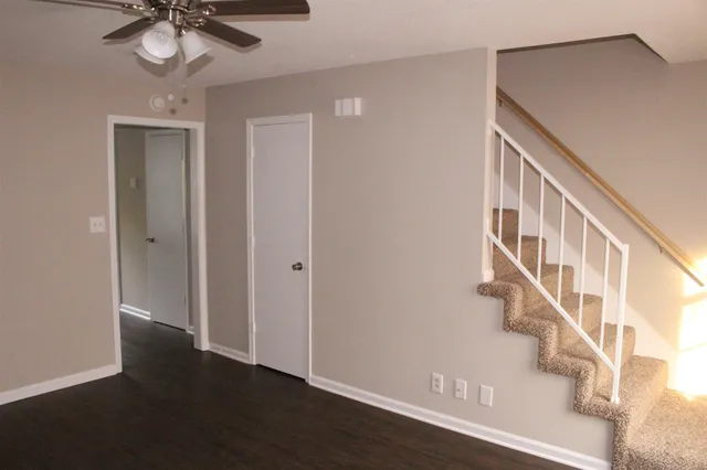 a view of entryway with wooden floor