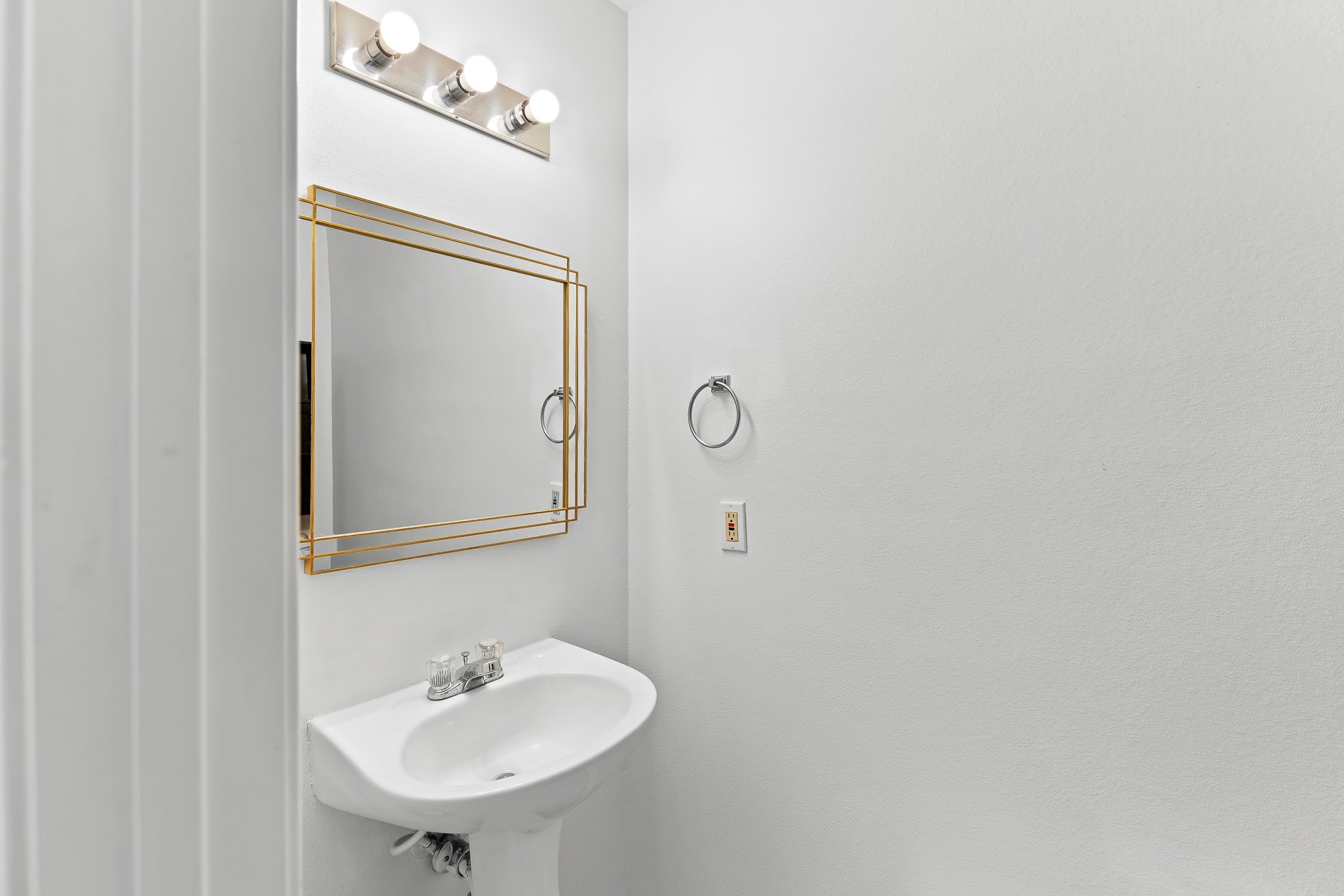 6700 Tulloch Way Austin, TX 78754 - Photo 22 of 39 a bathroom with a sink and a mirror