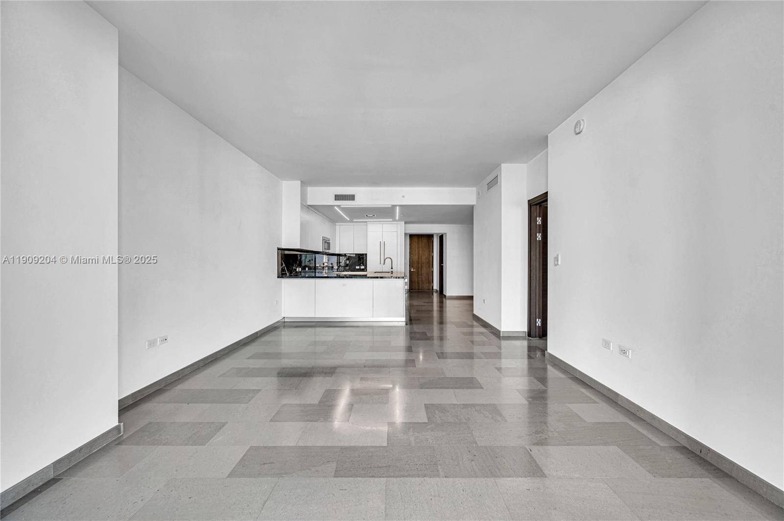 88 Southwest 7th Street, Unit 806 Miami, FL 33130 - Photo 21 of 54 a view of a kitchen with a sink
