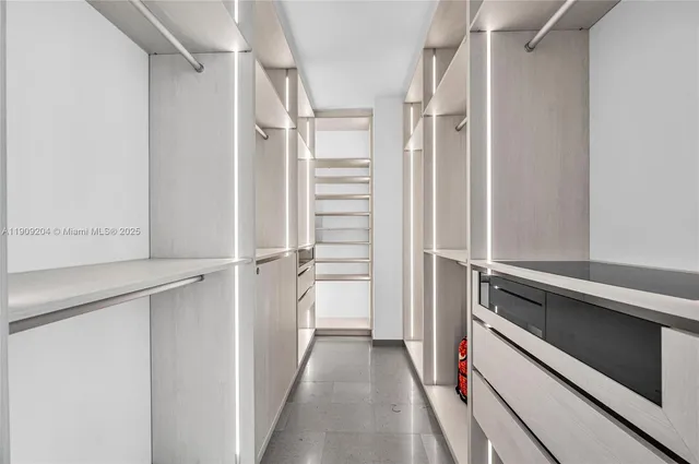 a bathroom with a double vanity sink mirror and toilet