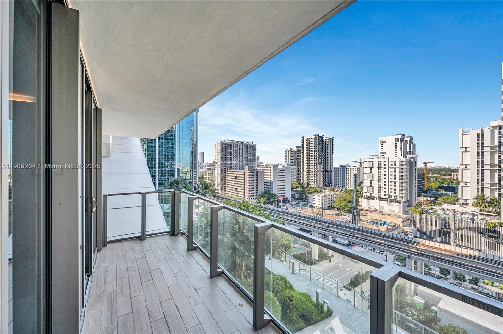 88 Southwest 7th Street, Unit 806 Miami, FL 33130 - Photo 39 of 54 a view of a balcony with city view
