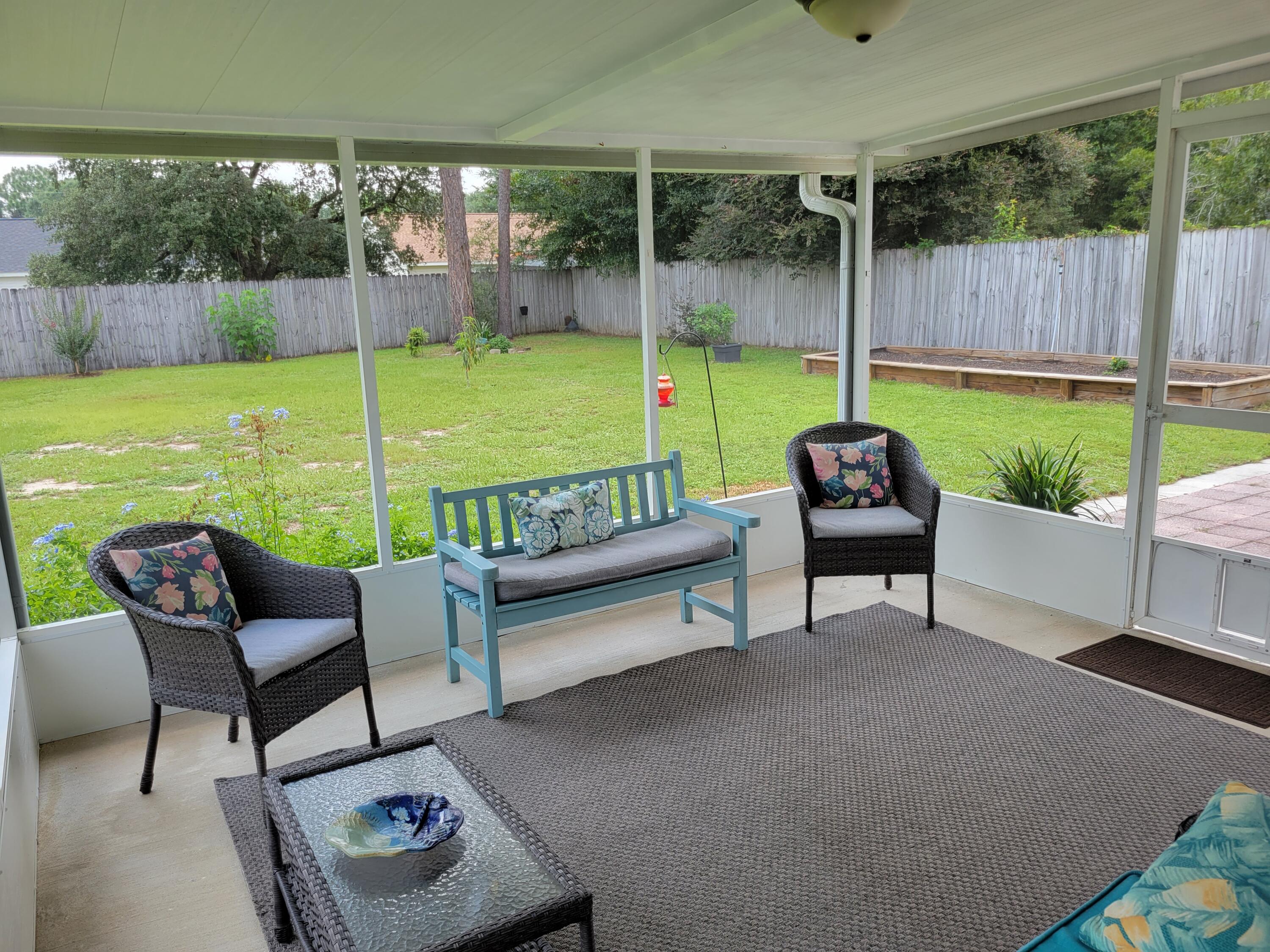 4712 Whitewater Lane Crestview, FL 32539 - Photo 6 of 25 a building view with outdoor seating space