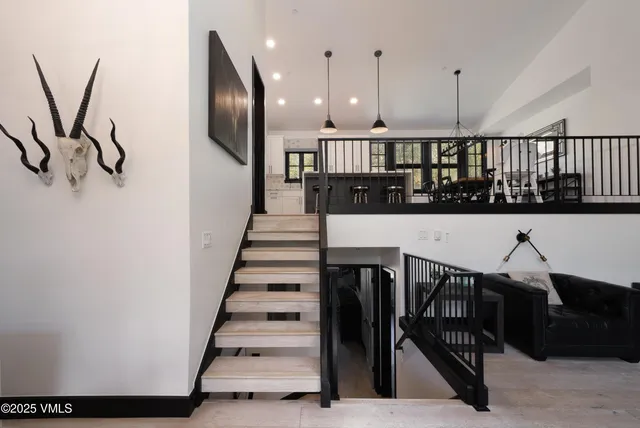 a view of a hallway with seating space