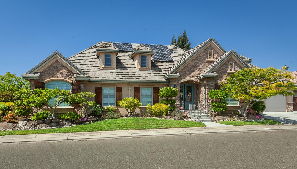 1111 Brighton Way Lodi, CA 95242 - Photo 2 of 87 a front view of a house with a garden