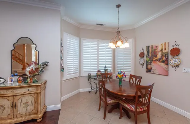a living room with a fireplace and a flat screen tv
