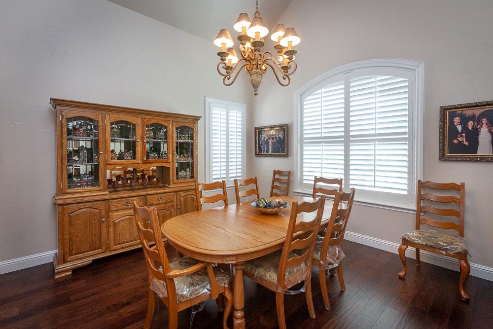 1111 Brighton Way Lodi, CA 95242 - Photo 26 of 87 a dining room with furniture a window and wooden floor