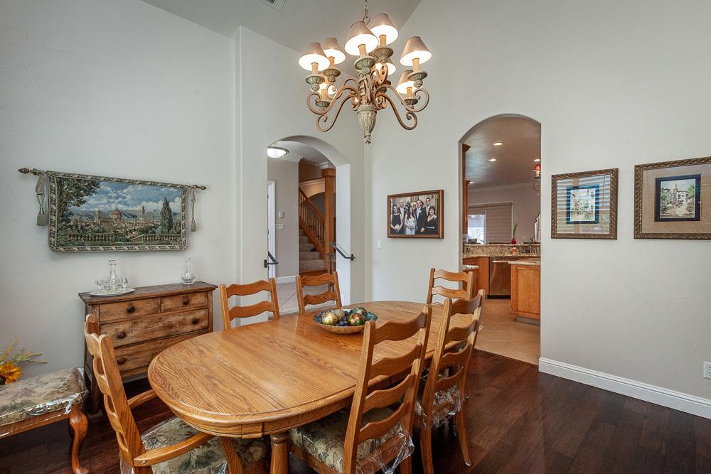 1111 Brighton Way Lodi, CA 95242 - Photo 28 of 87 a view of a dining room with furniture and chandelier