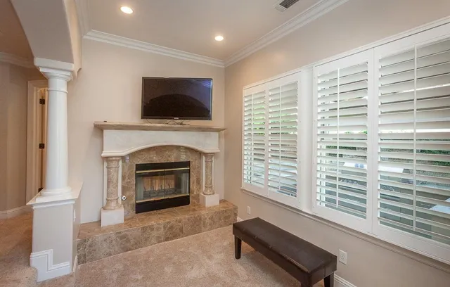 a view of a living room and dining room