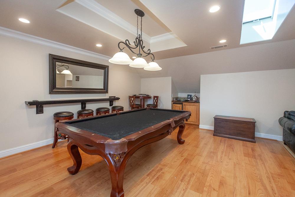 1111 Brighton Way Lodi, CA 95242 - Photo 56 of 87 a room with a table chairs and wooden floor