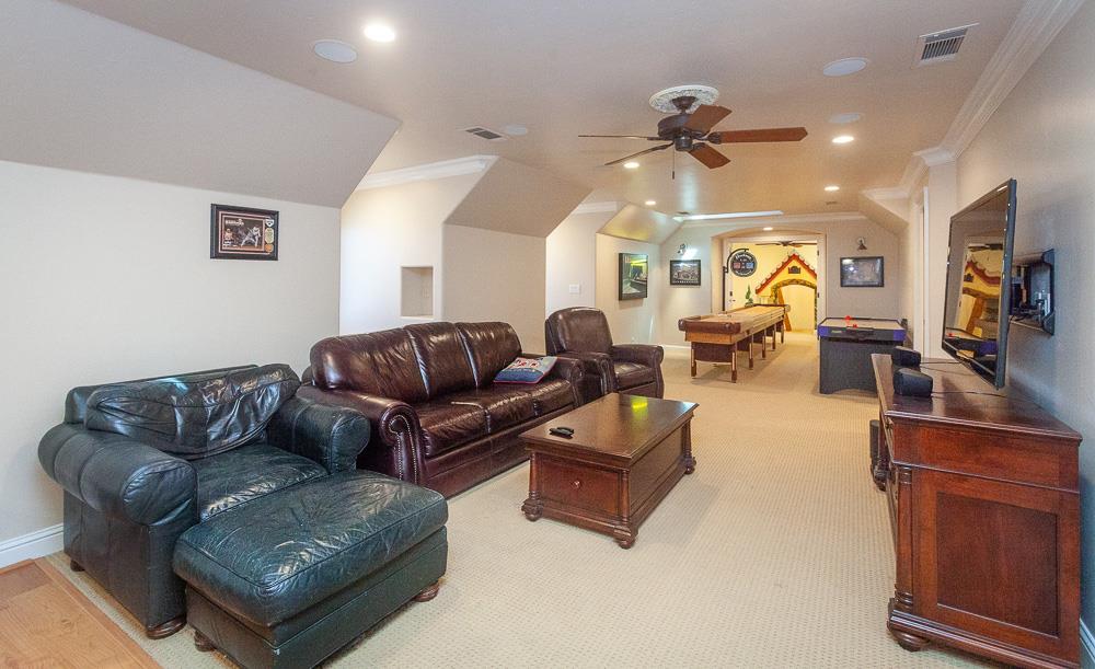 1111 Brighton Way Lodi, CA 95242 - Photo 59 of 87 a living room with furniture and a chandelier