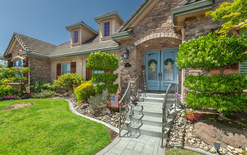 1111 Brighton Way Lodi, CA 95242 - Photo 6 of 87 a front view of a house with garden