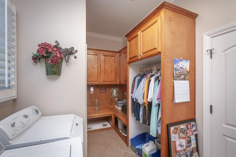 1111 Brighton Way Lodi, CA 95242 - Photo 75 of 87 a view of walk in closet with clothes and shoes
