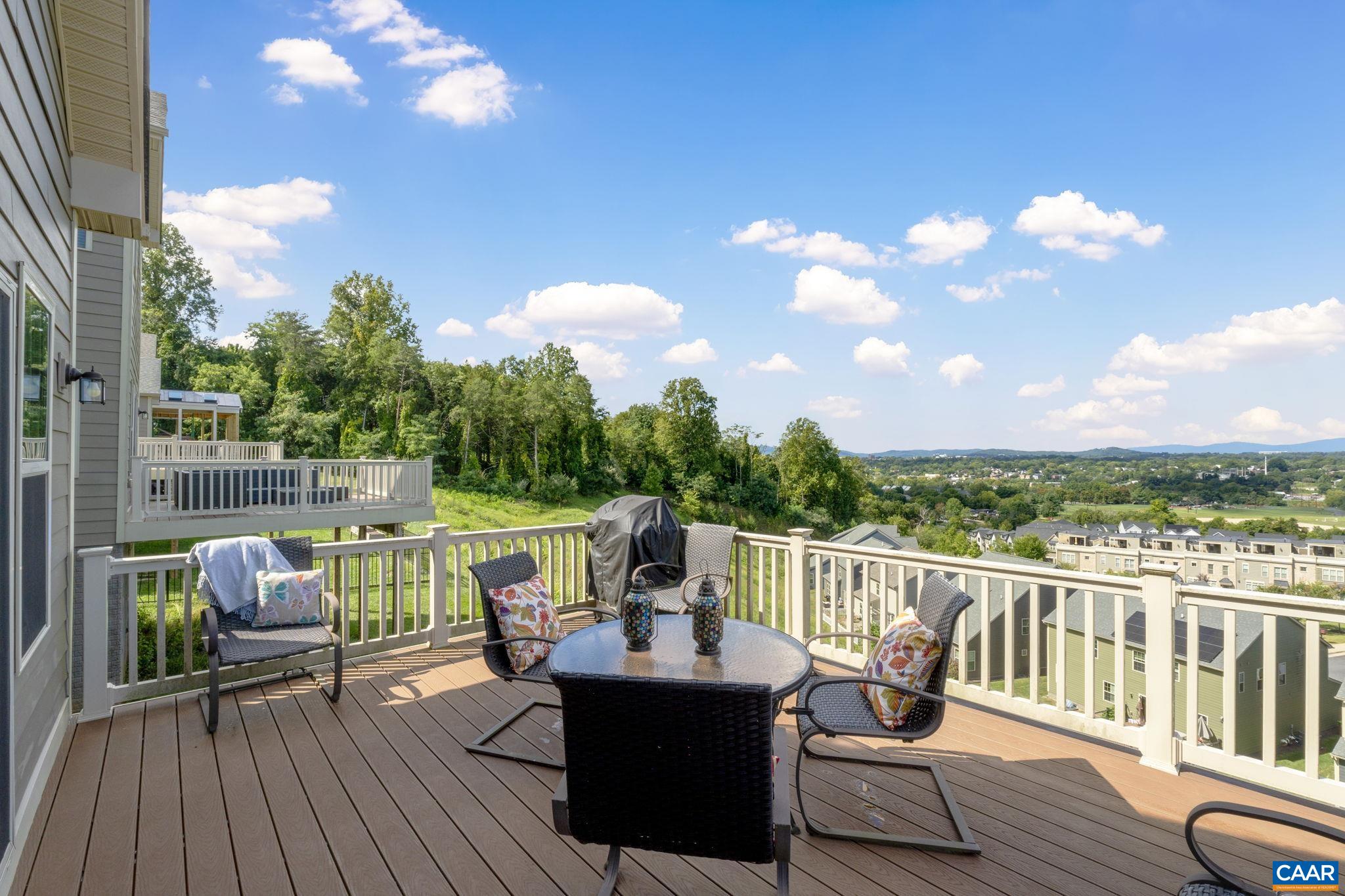 1516 Delphi Lane Charlottesville, VA 22911 - Photo 13 of 74 a view of a balcony with wooden floor and outdoor seating