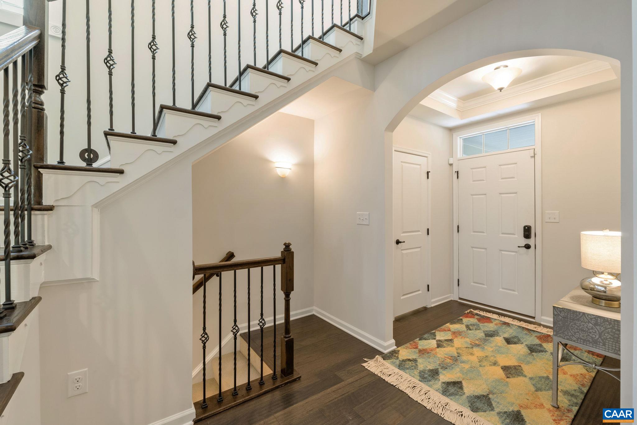 1516 Delphi Lane Charlottesville, VA 22911 - Photo 21 of 74 a view of hallway with wooden floor and stairs